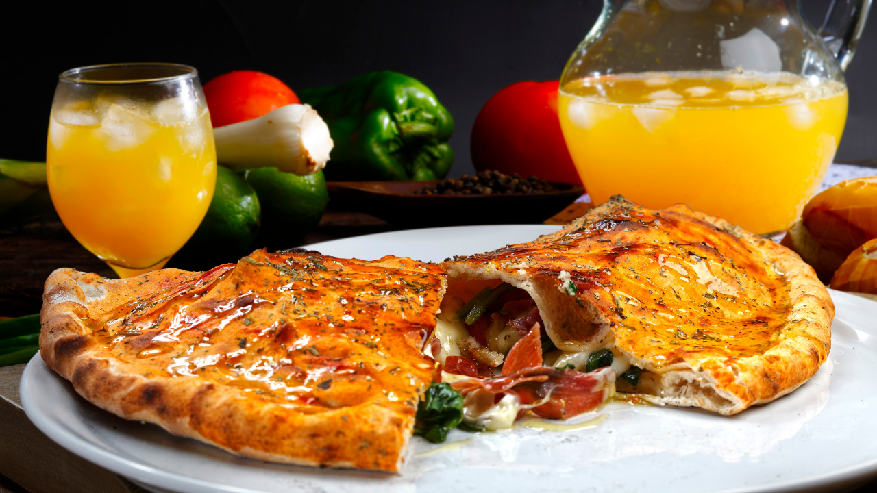 9. Pizza calzone with ham, mozzarella, and tomato